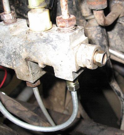 Proportioning valve plug.
